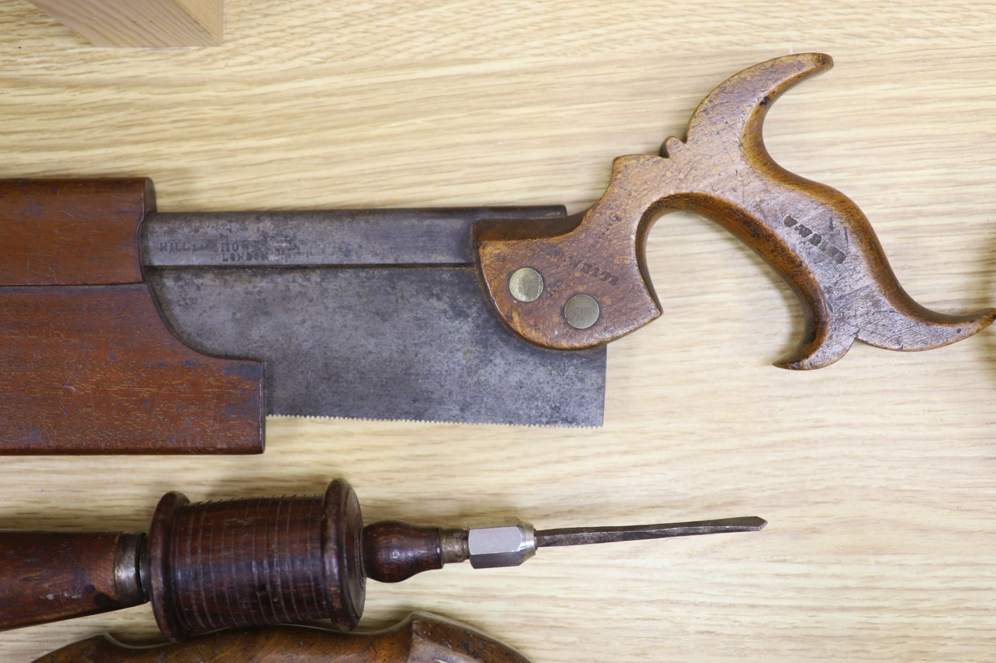 A Victorian beechwood brace, a Victorian tenon saw and one other tool (3)